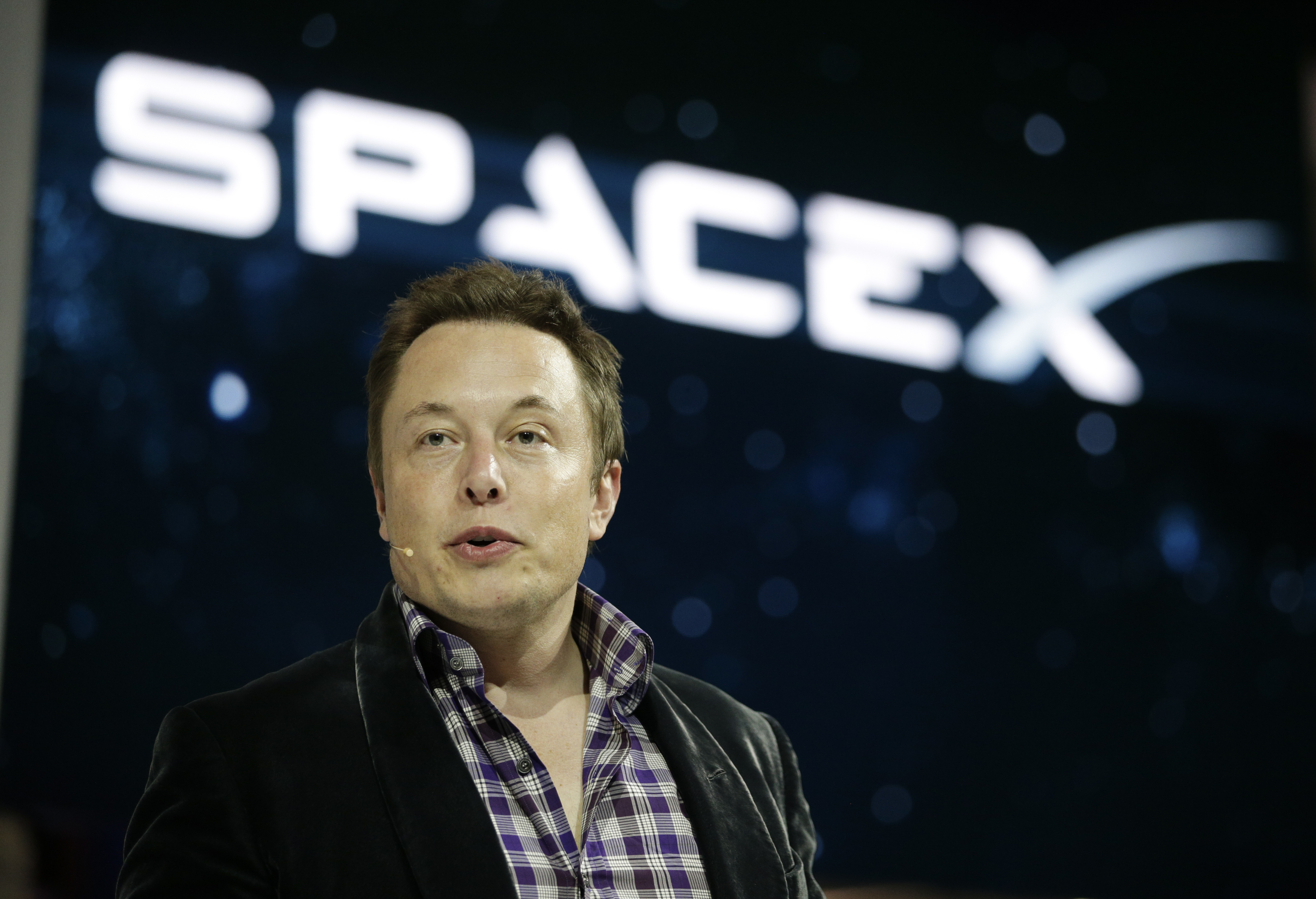 SpaceX CEO Elon Musk, shown in a file photo, said in an interview at tech news site Recode's Code Conference in Southern California on Wednesday that people will be on Mars in 2025. | AP